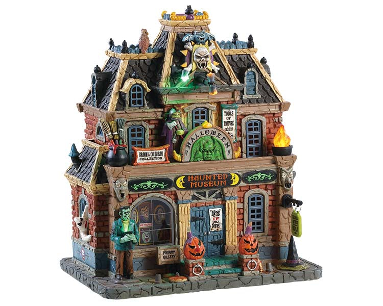 A Haunted Museum full of monsters is covered in a gargoyl, jack-o'-lanterns, ghosts and various other creates. Frankentein stands out front.