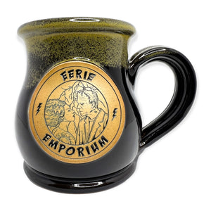 Eerie Emporium Frankenstein Coffee Mug In Stormy Night Color Scheme - Frankenstein and Frankenstein's Bride stare longingly into each others eyes while lightening bolts usher in darkness around them on this black and yellowish-green drip glaze coffee mug.