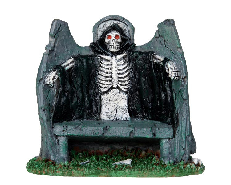 
            
                Load image into Gallery viewer, Lemax Spooky Town Reaper Bench #34608 at Eerie Emporium - A stone bench has a skeleton wearing a black robe with red eyes standing behind it.
            
        