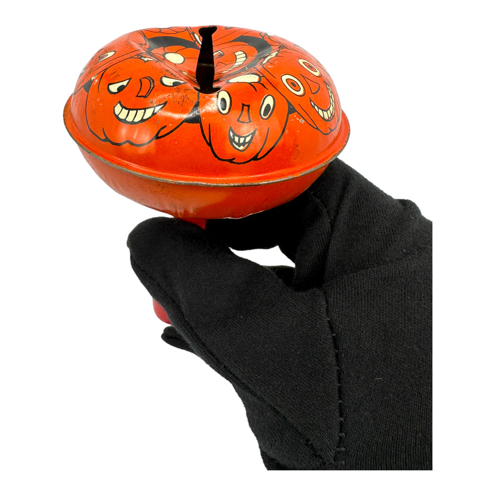 Vintage Halloween T. Cohn Tin Rattler Jack O' Lantern Noisemaker from the 1940s at Eerie Emporium.