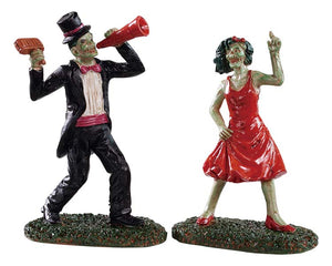 
            
                Load image into Gallery viewer, Lemax Spooky Town The Dancing Dead, Set of 2 #92730 at Eerie Emporium - 2 well dressed ghouls in a black suit and red dress dance together.
            
        
