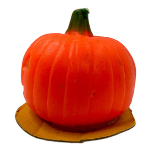 Vintage Halloween SUNI Pumpkin Candle with Base at Eerie Emporium.