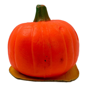 Vintage Halloween SUNI Pumpkin Candle with Base at Eerie Emporium.