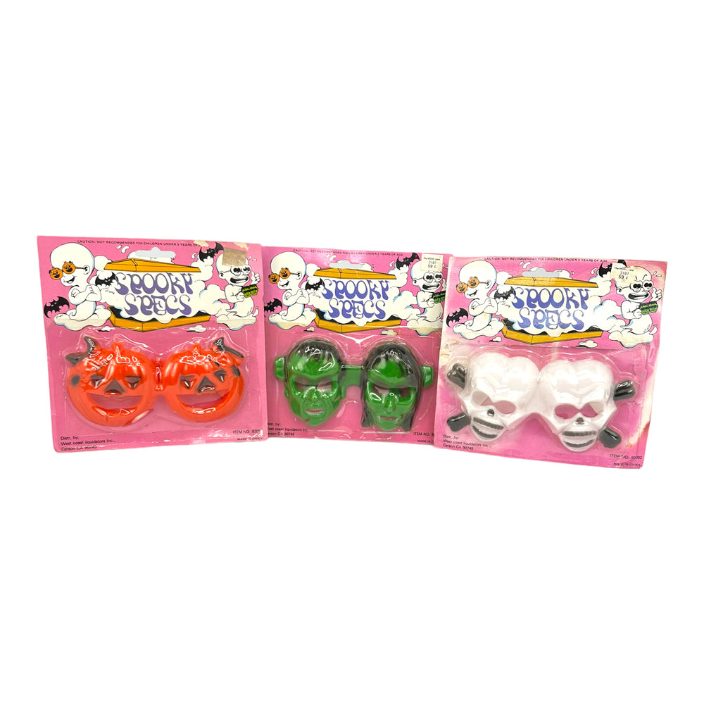 
            
                Load image into Gallery viewer, Vintage Halloween Spooky Specs Plastic Toy Glasses, Set of 3 from the 1970s/1980s at Eerie Emporium.
            
        