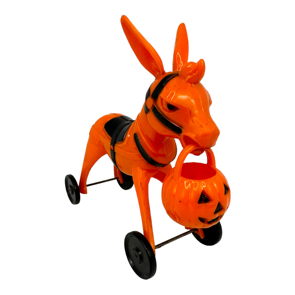 Vintage Halloween Rosbro/Tico Toys Orange Donkey On Wheels with JOL ~ 1950s Hard Plastic Candy Container at Eerie Emporium.