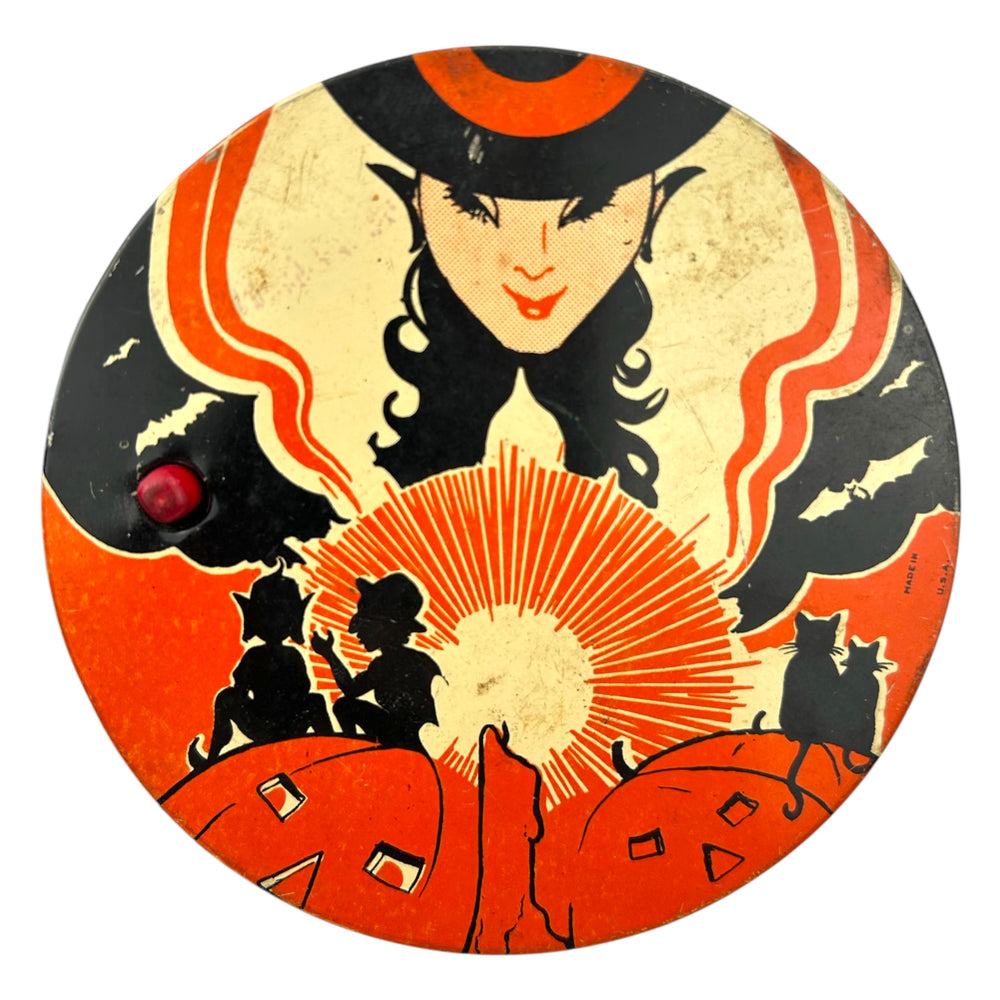 Vintage Halloween 1930s T. Cohn Tin Litho Ratchet Noisemaker Witch w/ Orange Coloring at Eerie Emporium. 