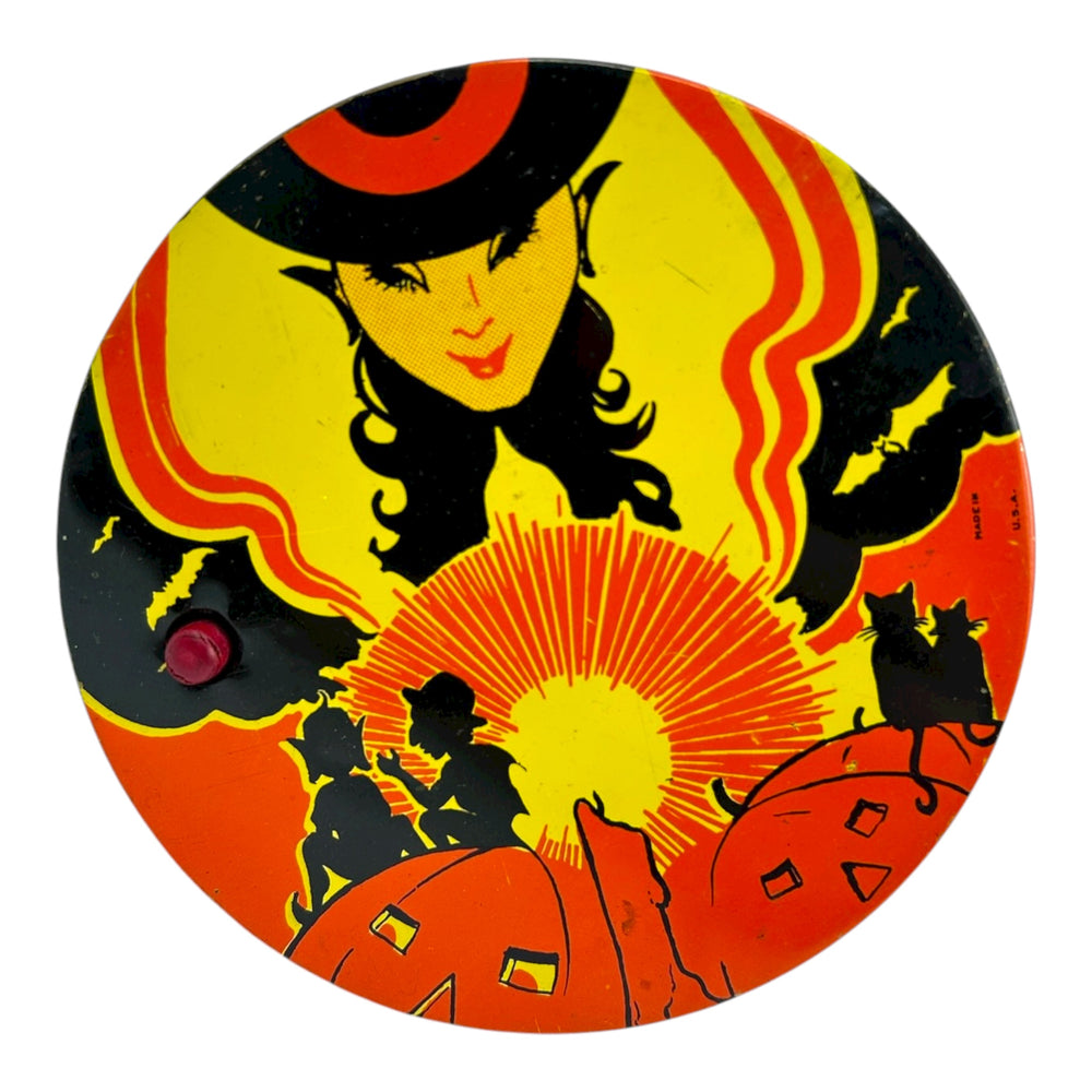 Vintage Halloween 1930s T. Cohn Tin Litho Ratchet Noisemaker Witch w/ Orange Yellow Coloring at Eerie Emporium.