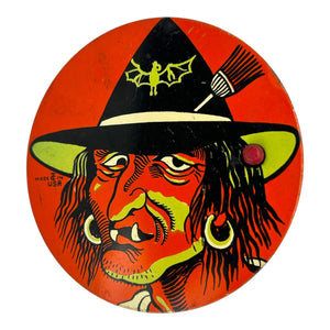 Vintage Halloween T. Cohn Tin Ratchet Noisemaker Scary Witch with Fangs + Green Coloring at Eerie Emporium. 2