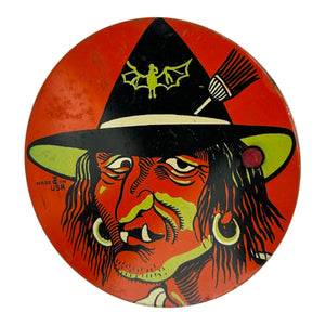 Vintage Halloween T. Cohn Tin Ratchet Noisemaker Scary Witch with Fangs + Green Coloring at Eerie Emporium. 3