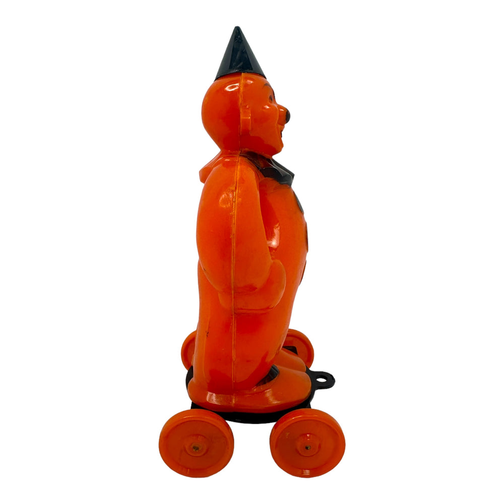Vintage Halloween Rosbro Plastic Clown On Wheels Candy Container / Toy from the 1950s at Eerie Emporium.