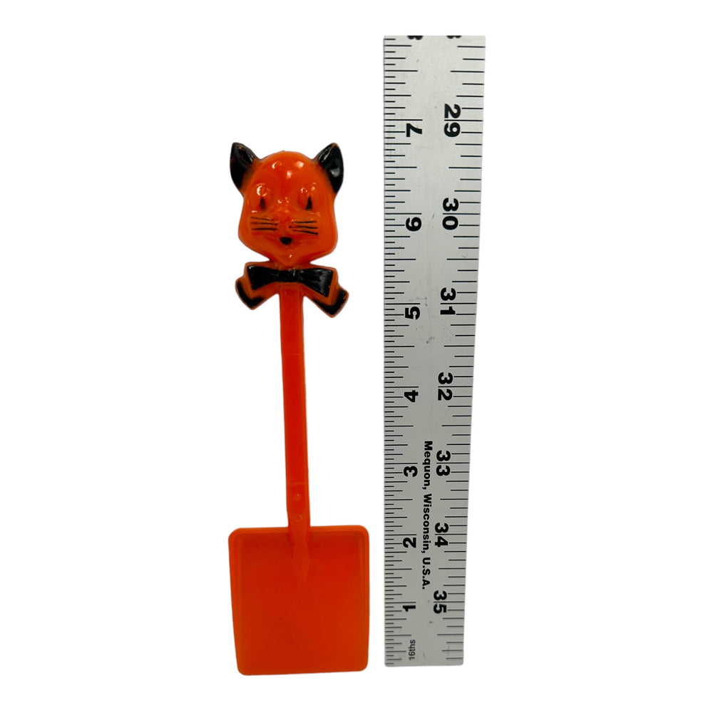 Vintage Halloween Rosbro Plastic Cat Shovel Candy Holder Toy from the 1950s at Eerie Emporium.