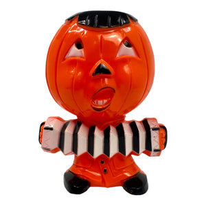 Vintage Halloween Hard Plastic Rosbro Jack-O'-Lantern Playing Accordion Candy Container from the 1950s at Eerie Emporium.