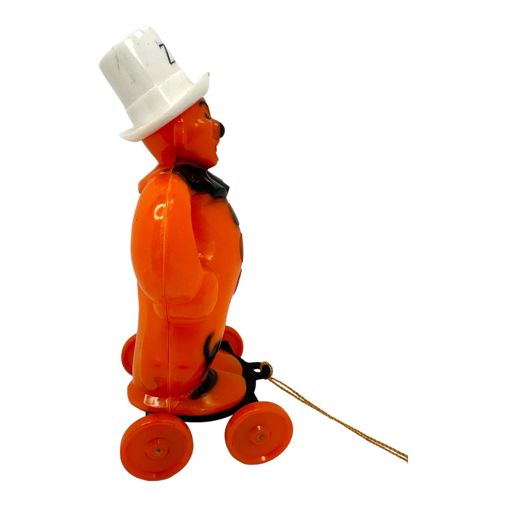 Vintage Halloween Rosbro Plastic Zook Clown On Wheels Candy Container / Toy from the 1950s at Eerie Emporium.