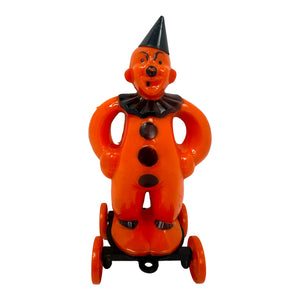 Vintage Halloween Rosbro Plastic Clown On Wheels Candy Container / Toy from the 1950s at Eerie Emporium.
