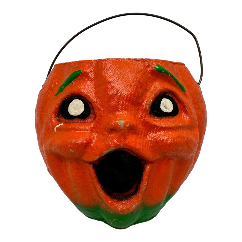 Vintage Halloween paper mache jack o' lantern candy container from the 1950s at Eerie Emporium.