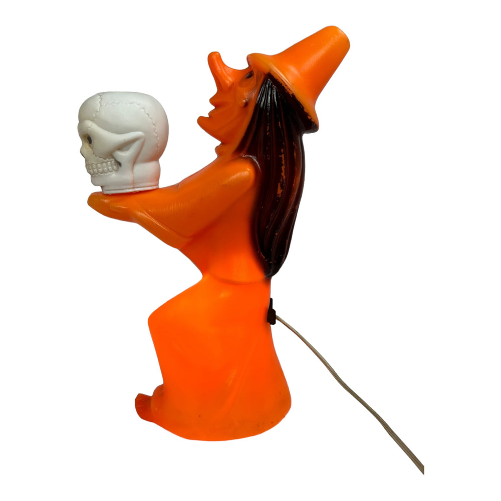 Vintage Halloween Tico Toys Witch Holding Skull Tabletop Blow Mold at Eerie Emporium.