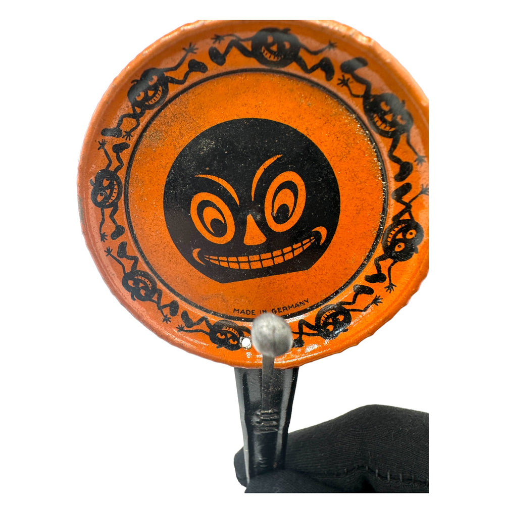 Antique Halloween 1920s Tin Grinning Jack-O'-Lantern Noisemaker Made In Germany and very rare at Eerie Emporium.