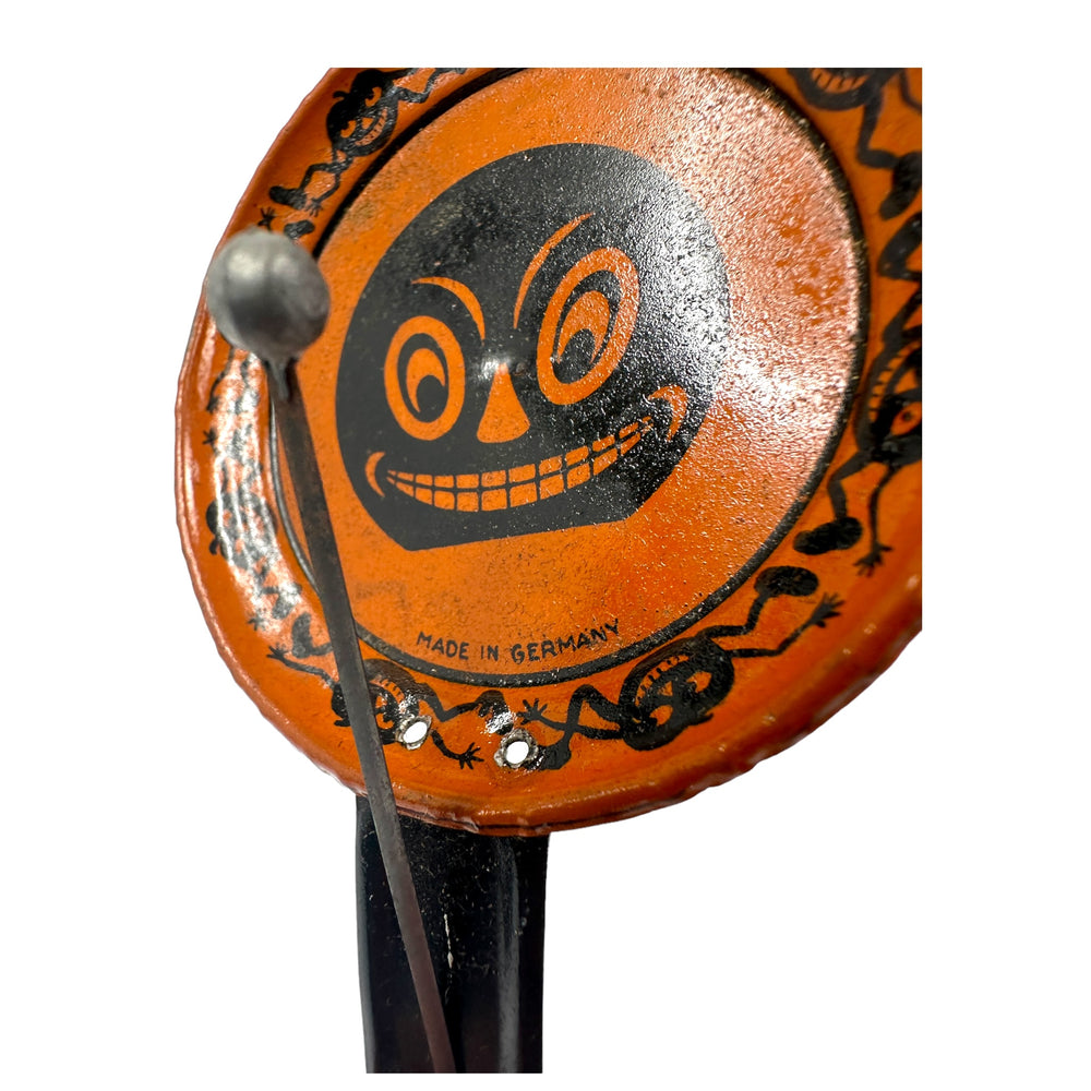 Antique Halloween 1920s Tin Grinning Jack-O'-Lantern Noisemaker Made In Germany and very rare at Eerie Emporium.