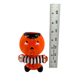 Vintage Halloween Hard Plastic Rosbro Jack-O'-Lantern Playing Accordion Candy Container from the 1950s at Eerie Emporium.