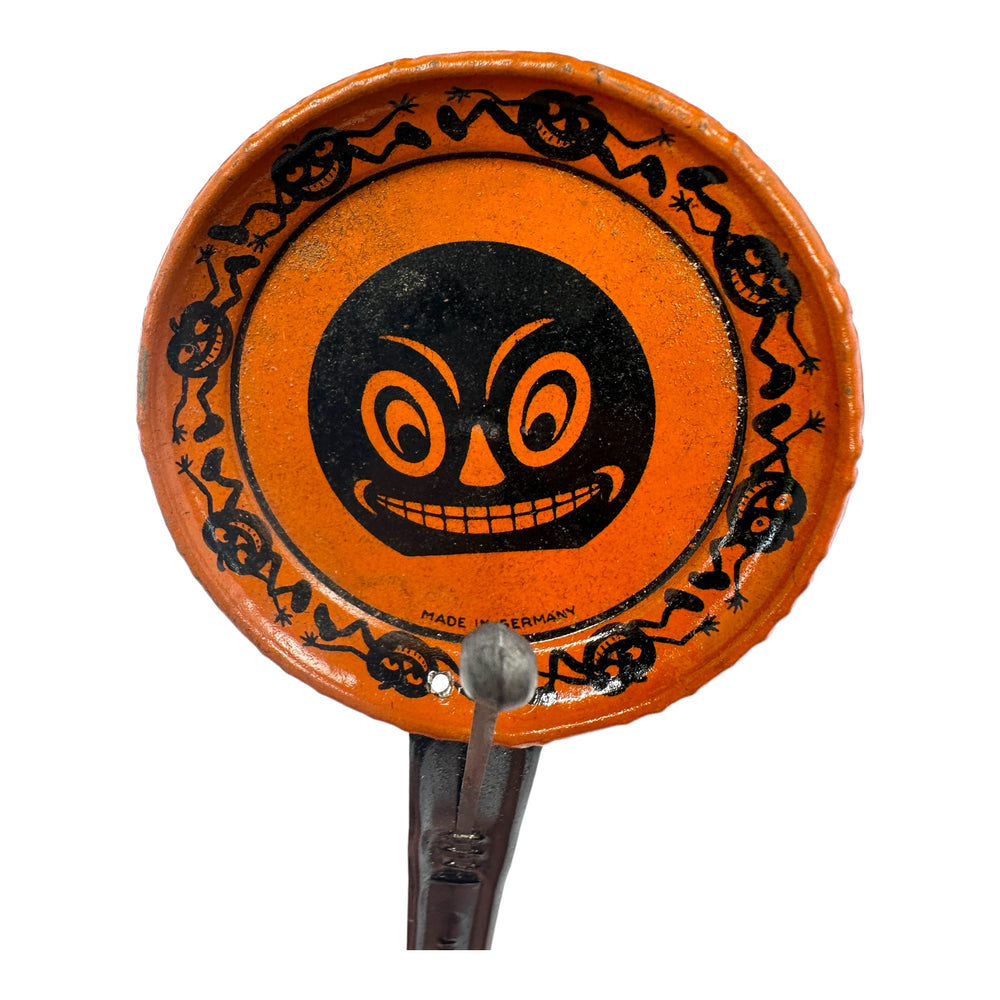 Antique Halloween 1920s Tin Grinning Jack-O'-Lantern Noisemaker Made In Germany and very rare at Eerie Emporium.