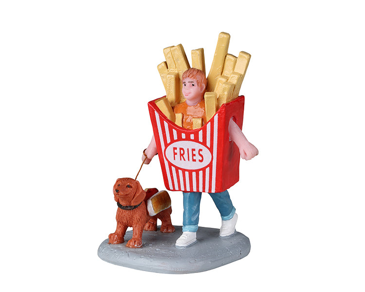 A boy is dressed as french fries for his Halloween costume while his small dog is dressed as a hot dog.