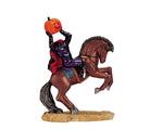 A headless horseman lifts a sinister jack-o'-lantern over his body while his evil red eyed steed bucks in anticipation of a chase.