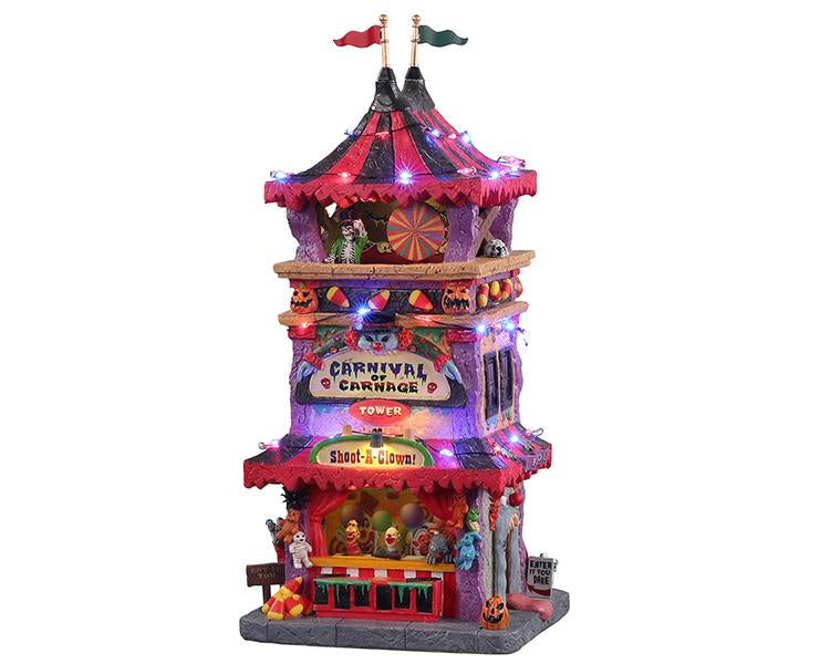 Three-level tower that has its main entrance guarded by a creepy clown mouth. The second level is decorated with worrisome signs, including one that warns you there's no turning back. At the top is a classic circus-tent roof with blowing flags, exterior lighting, and scary characters lurking in the shadows.
