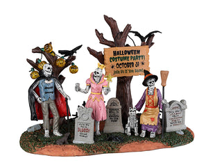 Three Skeletons are dressed in costumes in a cemetery with a sign a sign that reads "Halloween Costume Party! October 31". There's a skeleton dog in front of one of the skeletons and string lights handing from one of the trees behind the trio.