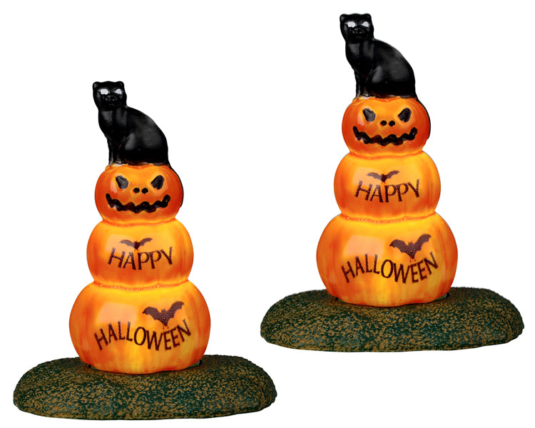 Mini black cat/pumpkin structures in the shape of classic Halloween blow molds.