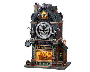 A large clock tower has a multiple grim reapers guarding a main skull clock. On the bottom floor there's a large window with an old skeleton man inside working on clocks. There's a sign that reads "B.A. Freyed Clocksmith".