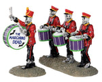 Four skeletons dressed in red jackets and red and black pants march and drum on their purple and green drums using bones. One Skeleton is the leader out in front with a drum that reads The Marching Dead.