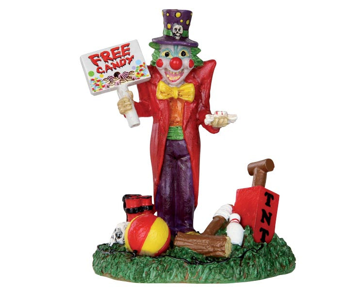 A sinister clown with creepy face paint and a purple top hat holds a sign in one hand that reads "free candy" and pieces of candy in the other hand. 