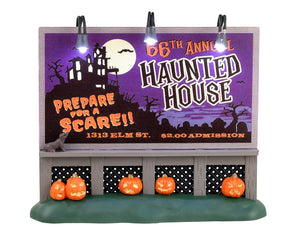 Lemax Spooky Town Haunted House Billboard #34075 - A purple sign reads Haunted House while jack o' lanterns rest at the base.