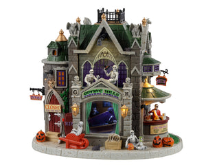 
            
                Load image into Gallery viewer, Lemax Spooky Town Gothic Hills Funeral Parlor #35002 - A stone building with a green roof is crawling with skeletons, gargoyles and jack o&amp;#39; lanterns.
            
        