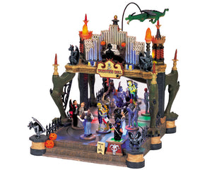 
            
                Load image into Gallery viewer, A large monsters ballroom where a menacing Dragon revolves from the rooftop around the ghoulish dancing couples below while a hatcheted ticket master moves from side to side.
            
        