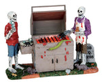 Two skeletons stand over a spooky grill full of spiders, snakes and rats. 