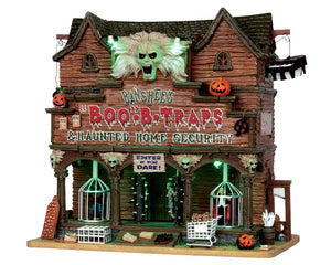 
            
                Load image into Gallery viewer, A large building has Banshee&amp;#39;s Boo-B-Traps &amp;amp; Haunted Home Security is written across the front.  Cages drop down over a werewolf and vampire while pumpkins, cages and skulls warn visitors not to enter!
            
        