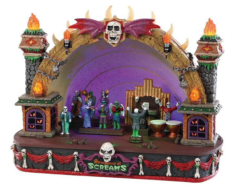 A large Amphitheater is full of a skeleton orchestra playing various instruments including the drums, violins, flutes, an organ and more. Chains, skulls, flames and purple and green lighting add extra spooky elements to this piece.