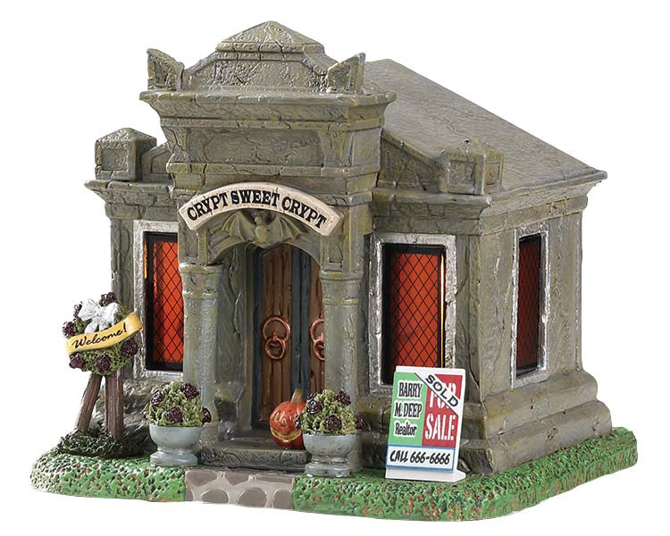 A stone crypt has a sign on the front that says "Crypt Sweet Crypt" and another on the ground that reads For sale/Sold.