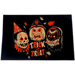 A poster of 3 vintage style trick or treaters wearing a witch mask, vampire mask and ghoul mask are above lettering that says Trick or Treat.