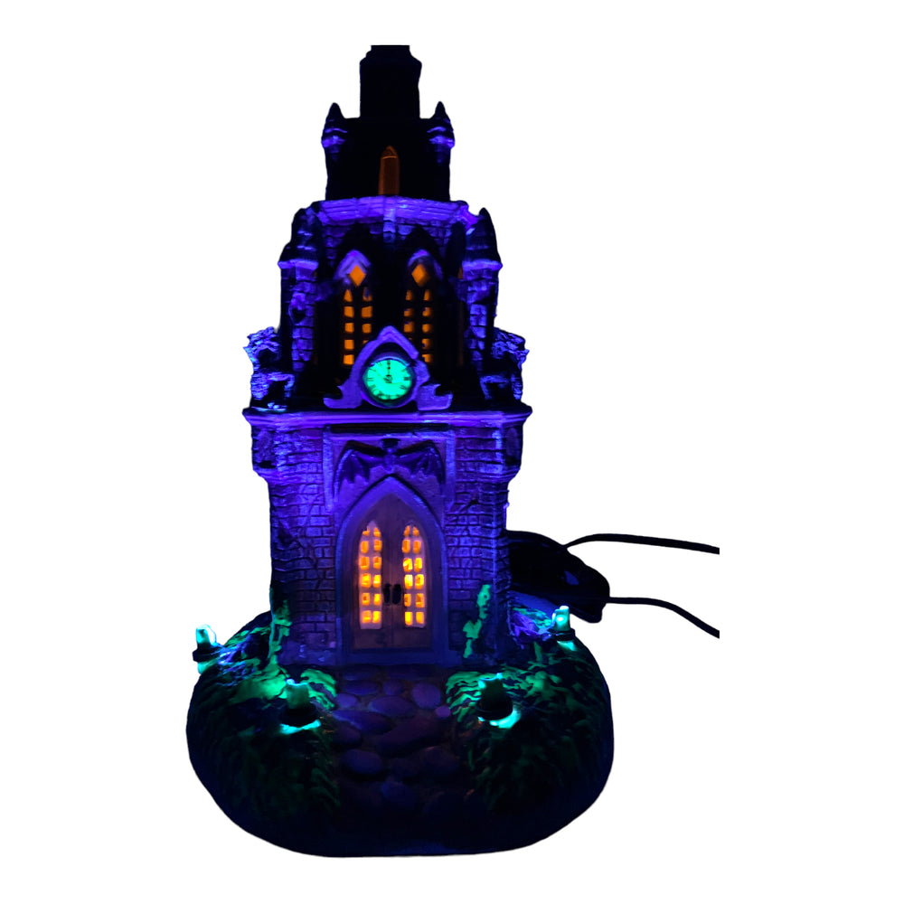 
            
                Load image into Gallery viewer, Retired Lemax Spooky Town Spooky Time #65345 - A gothic castle covered in gargoyles has a witch and ghosts lying above it. 
            
        