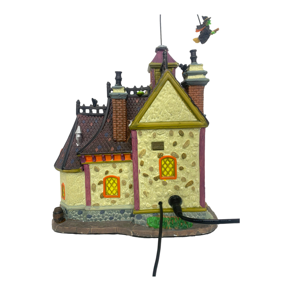 
            
                Load image into Gallery viewer, Retired Lemax Spooky Town Full Moon Apothecary #85664 - A witch flys over a purple and orange cottage shop.
            
        