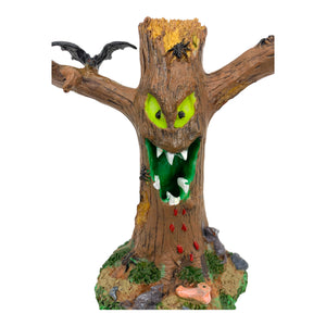 Retired Lemax Spooky Town Creepy Tree #03801 - A monster tree has sharp teeth, evil yellow eyes and blood dripping from it's green mouth.