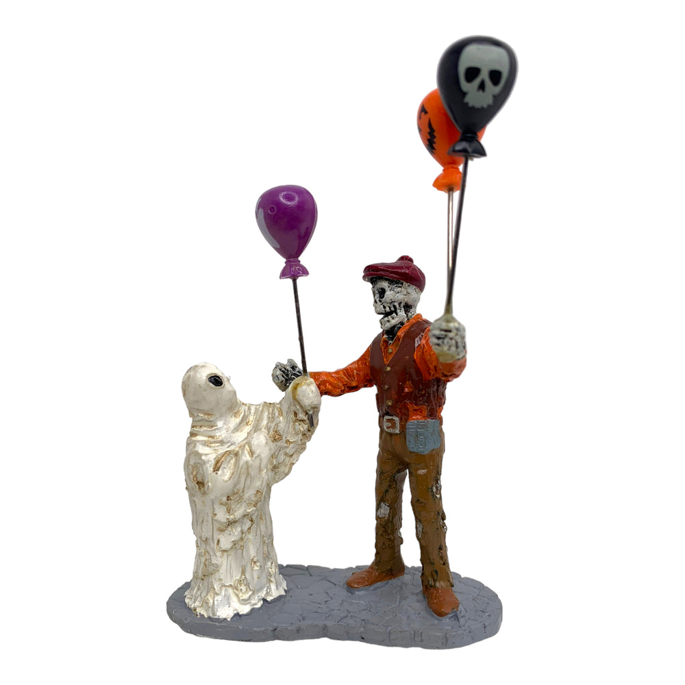 Retired Lemax Spooky Town Boolloon Seller #02800 - A skeleton sells Halloween themed balloons to a ghost.