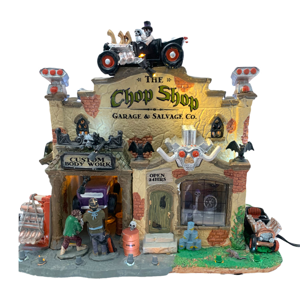 
            
                Load image into Gallery viewer, Lemax Spooky Town The Chop Shop Garage &amp;amp; Salvage Co. #25323
            
        