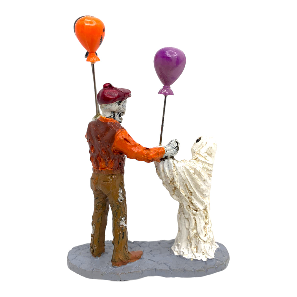 Retired Lemax Spooky Town Boolloon Seller #02800 - A skeleton sells Halloween themed balloons to a ghost.