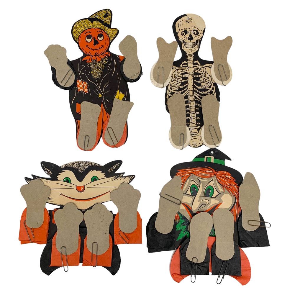 
            
                Load image into Gallery viewer, Vintage Halloween Dancers from the 1960s or 1970s. A Skeleton, a scarecrow, a witch and a black cat.
            
        