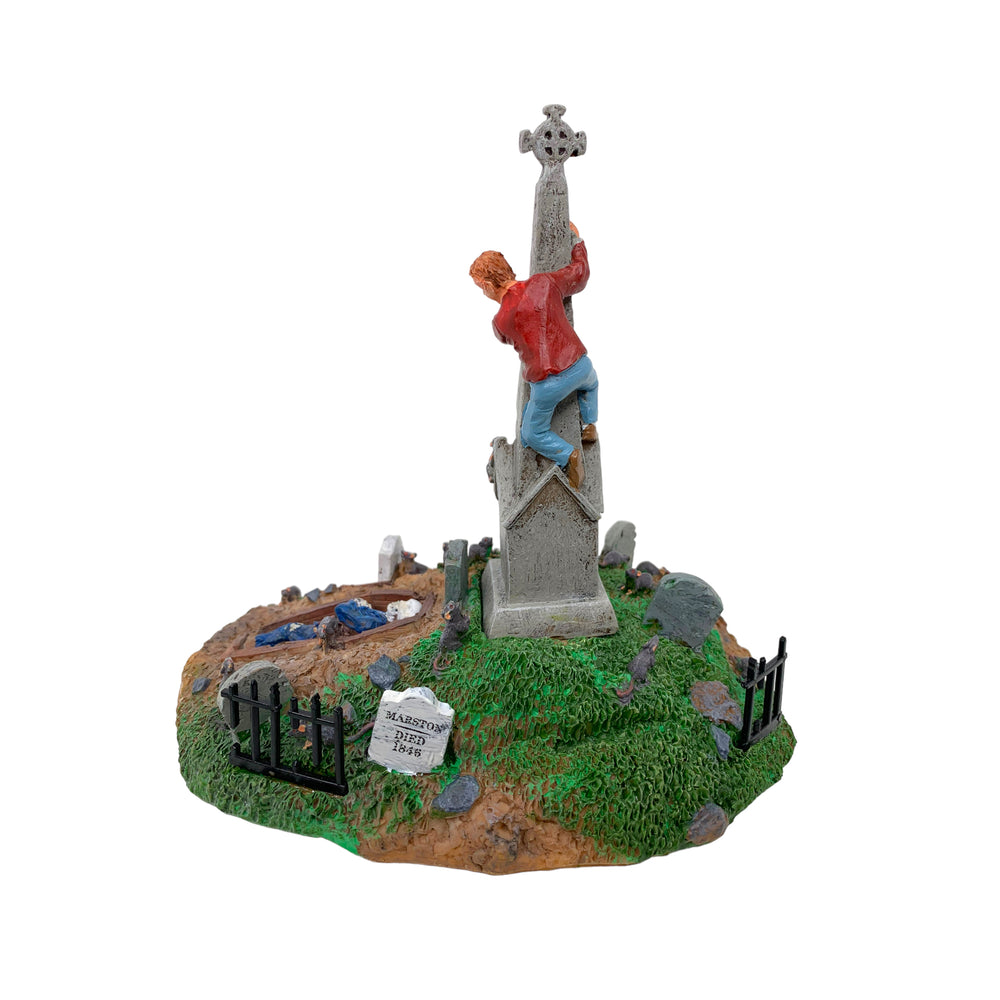 Retired Lemax Spooky Town Rat Attack #93722  - rats try to eat a man as he climbs up a large tombstone in a creepy cemetery