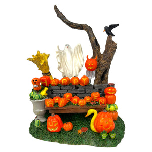 
            
                Load image into Gallery viewer, Retired Lemax Spooky Town Pumpkin Greeting #73604. Has Ghost, Jack o&amp;#39; lanterns and is a classic Halloween Village Table Accent. 
            
        