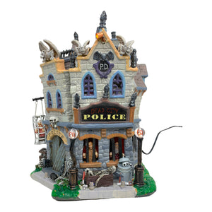 
            
                Load image into Gallery viewer, Retired Lemax Spooky Town Dead City Police Station #05001 - A creepy police station is covered in gargoyles and skeletons.
            
        